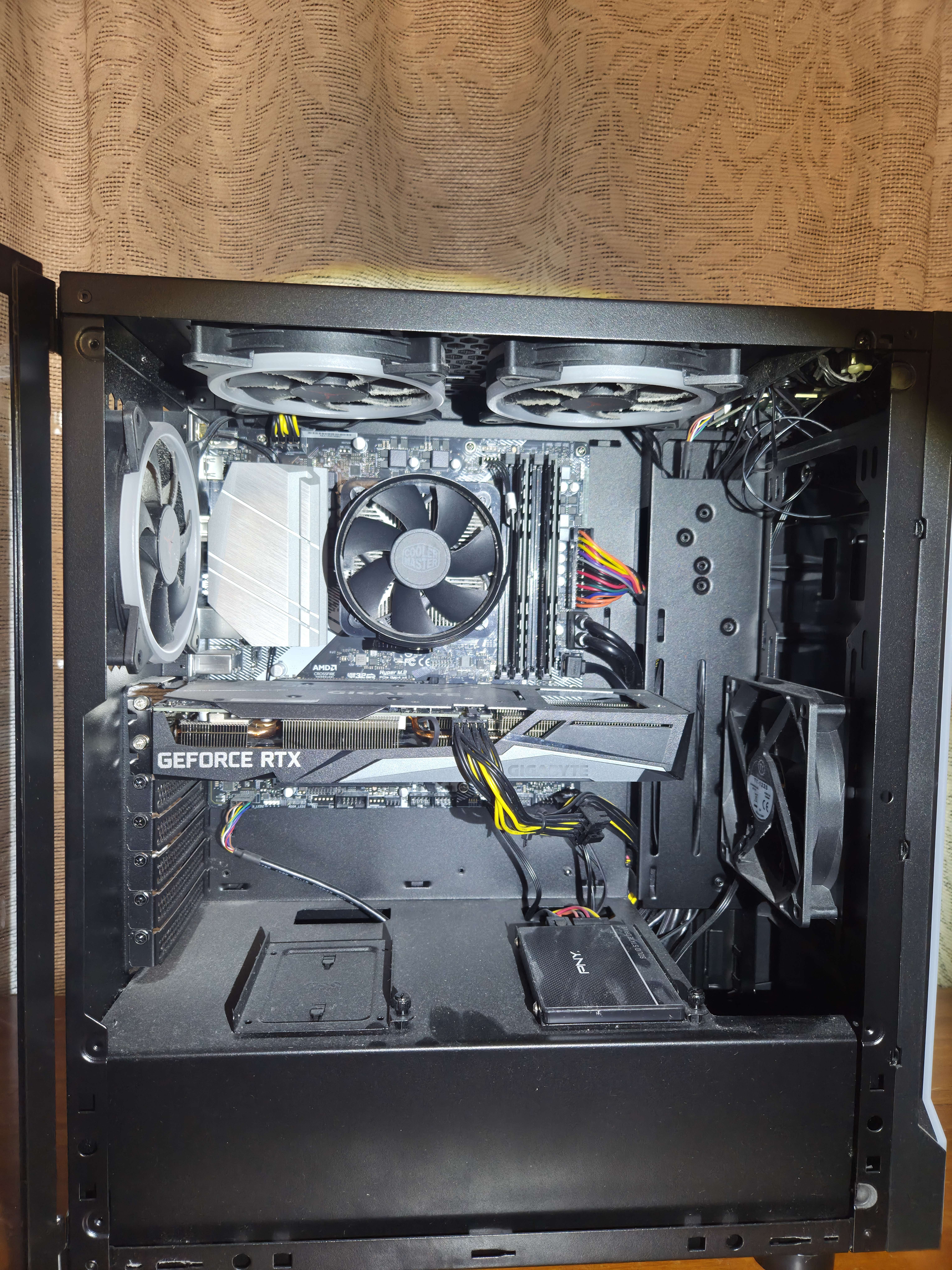 A computer with dust covering the inside.